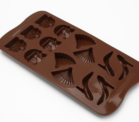 Os moldes frescos dos doces de chocolate, chocolate feito sob encomenda diminuto moldam bens