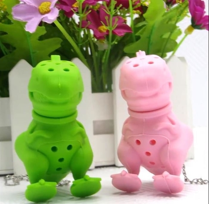 O dinossauro deu forma ao saquinho de chá livre do silicone do projeto BPA FDA com pacote da caixa