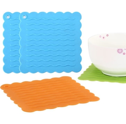 As ferramentas da cozinha do silicone de Placemat do gourmet gravaram o teste padrão de onda da água