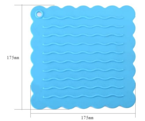 As ferramentas da cozinha do silicone de Placemat do gourmet gravaram o teste padrão de onda da água